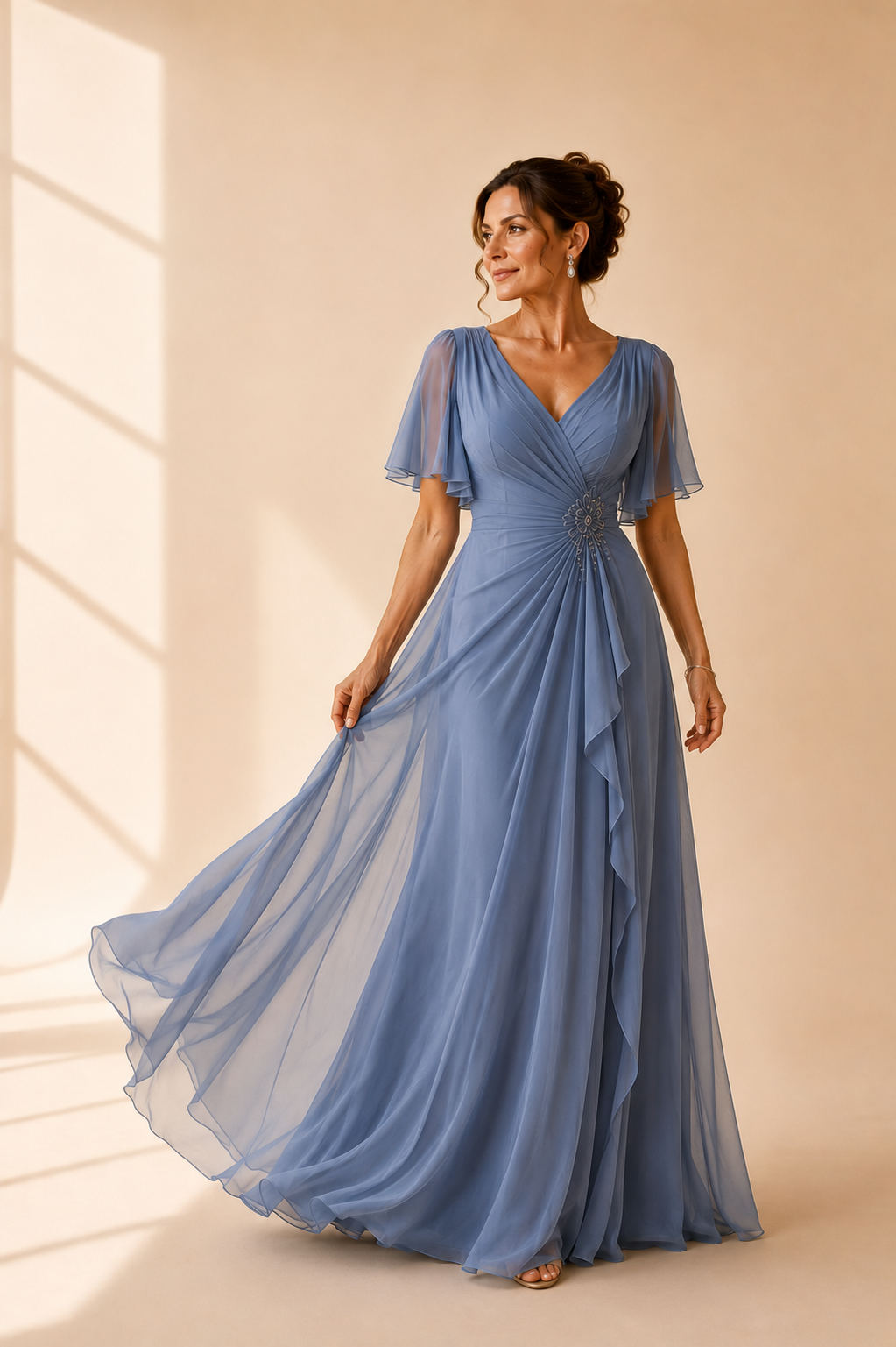 Elegant chiffon Mother of the Bride dress at Afina Luxury in Hallandale Beach