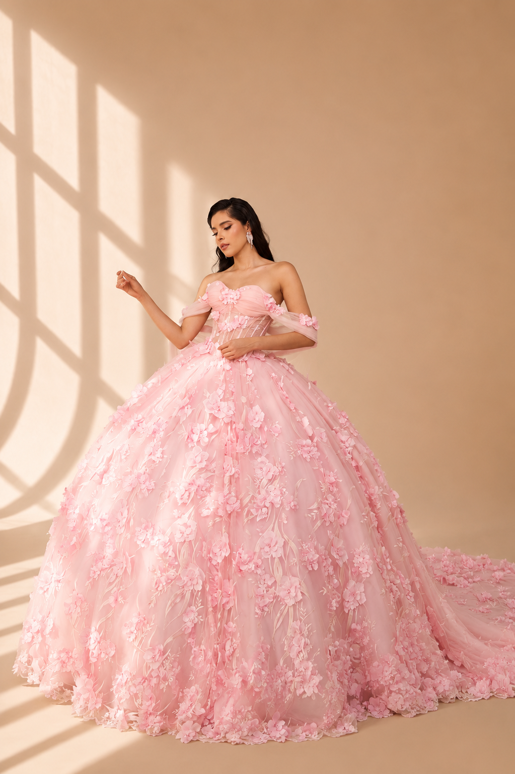 Quinceañera dress with elegant floral details at Afina Luxury